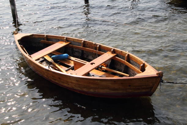 Wooden rowboat in a scandinavian fjord close to Oslo, Norway. Retro colored (polaroid) image.