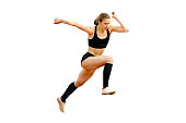female athlete triple jump on white background