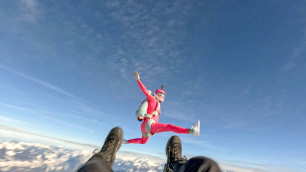 istock POV past legs to skydiver performing acrobatic moves 1468582522