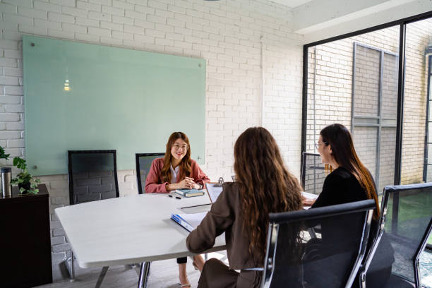 istock Putting Ideas into Action: Business Colleagues Planning for Success 1468583309