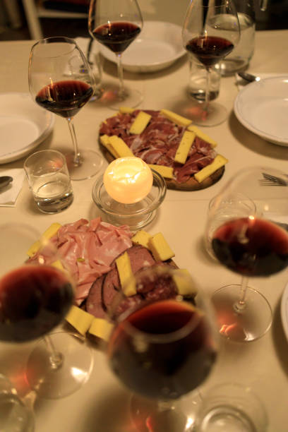 istock Salami and cheese wooden board and wine 1468585151