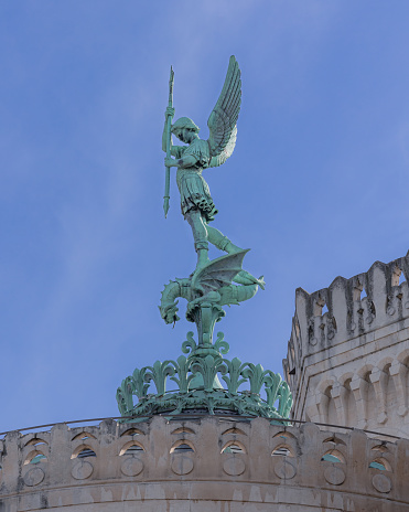 St Michael on a dragon on top La Basilique Notre Dame de Fourvière. Lyon, France.