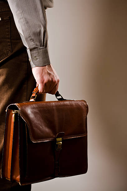 istock Businessman carries suitcase 146859394