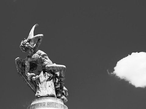 Monument of fallen Angel in Retiro Park, Madrid, Spain.