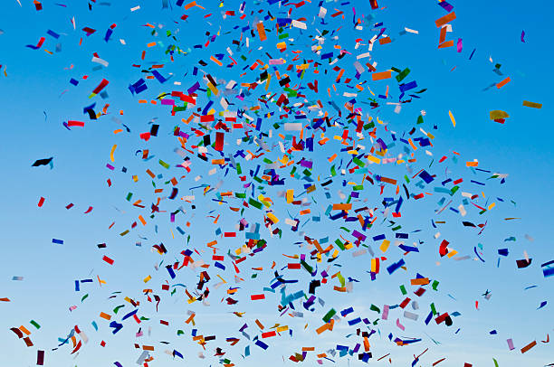 istock Confetti paper filled colorful blue sky background 146859843