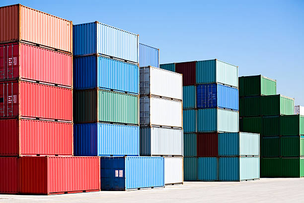 cargo freight containers at harbor terminal stock photo
