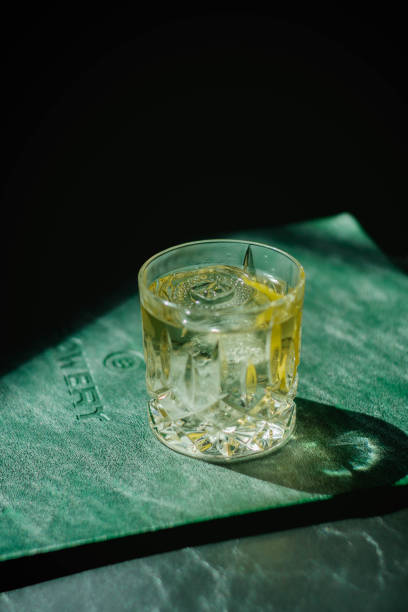 White Negroni A traditionally made Negroni is stirred, not shaken, it is built over ice in an old-fashioned or rocks glass and garnished with a slice of orange. Outside of Italy, an orange peel is often used in place of an orange slice. Gin stock pictures, royalty-free photos & images