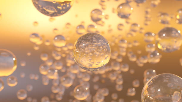 istock 3D cosmetic rendering Bubbles of Golden Serum against a blurred background 1468601158