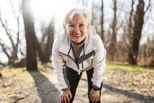 istock Senior woman taking a break resting looking at camera 1468602247