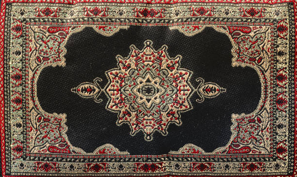 A rectangular Chinese-style carpet covers the entire floor, with a red pattern in the center and a white border on the sides. The carpet is placed on a grey stone floor, with Chinese vases positioned beside it