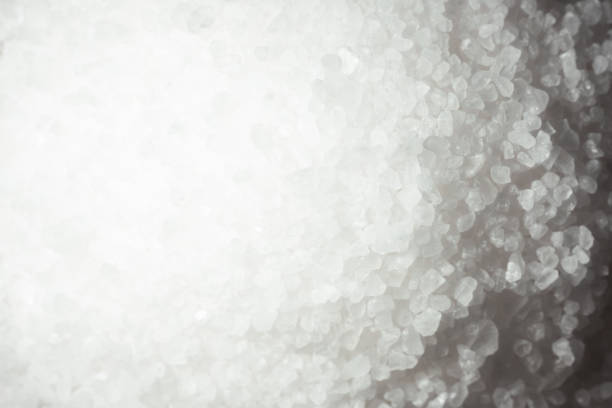 istock A pile of coarse white salt as a textured background. 1468603908
