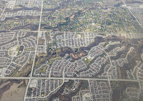 Aerial view of residential neighbourhoods in Ontario, Canada. Autumn afternoon.