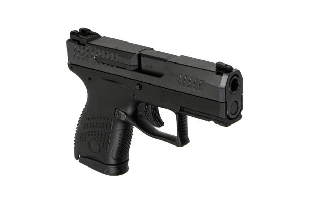istock Modern semi-automatic pistol isolate on a white background. Armament for the army and police. Short-barreled weapon. 1468607275