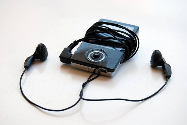 istock black mp3 player and earphone 146860816