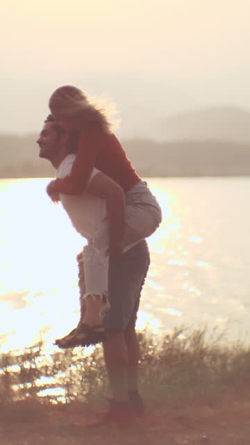 Woman piggyback her boyfriend