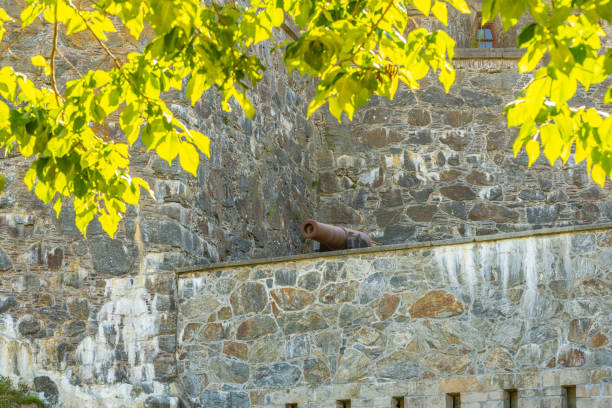 Kungälv, Sweden - July 15 2022: A lonely cannon at an old fortress.