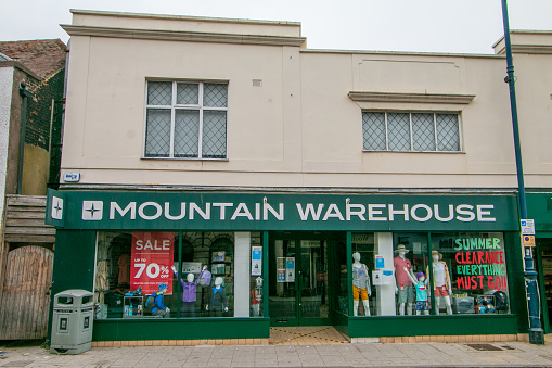 Summer clearance at Mountain Warehouse Outdoor Clothing and Equipment Shop on Whitstable High Street in Kent, England
