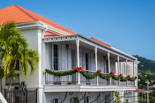 A second floor balcony in tropical St. Thomas with Christmas Decorations.
