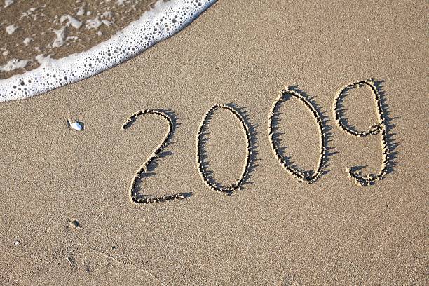 Number 2009 written in the sand