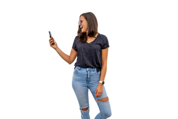 istock Excited young woman checking her smart phone 1468614491
