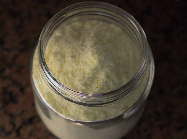 istock Glass container full of powdered milk. Natural light. 1468614824