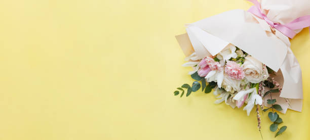 istock Beautiful bouquet on yellow background 1468616588