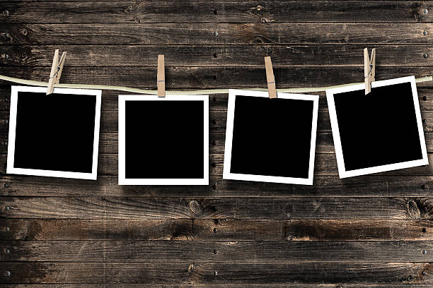 istock Blank photographs hanging on a clothesline 146862145