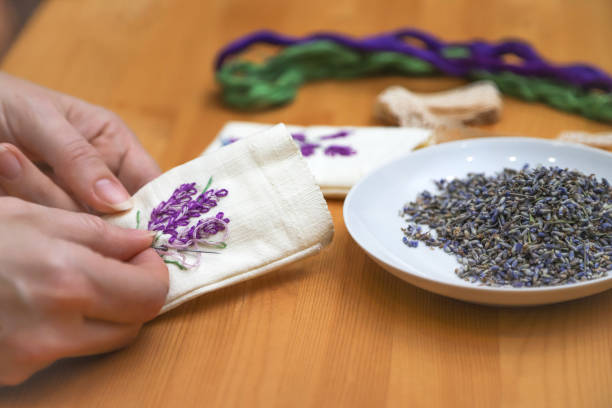 istock Making lavender aromatherapy sachet with floral embroidery at home. Zero waste DIY gift. Photo with selective focus 1468622094
