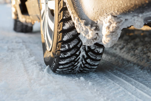 istock car winter tires on a snowy road 1468623091