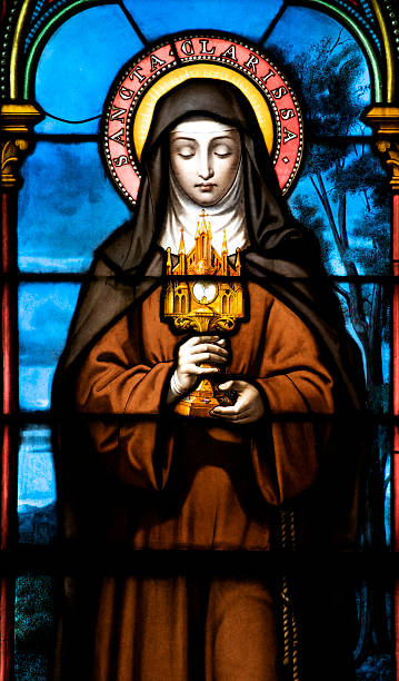 St. Claire Work by artist M. Lorin of Chartres, France. He was commissioned to prepare this painting on glass of St. Claire in 1878 religious saint stock pictures, royalty-free photos & images