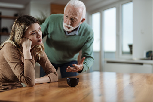 istock Senior  father  arguing with his adult daughter at home 1468623762