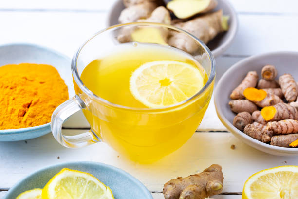 istock Curcuma longa and ginger, powder, rhizomes and tea. Complementary medicine 1468626355
