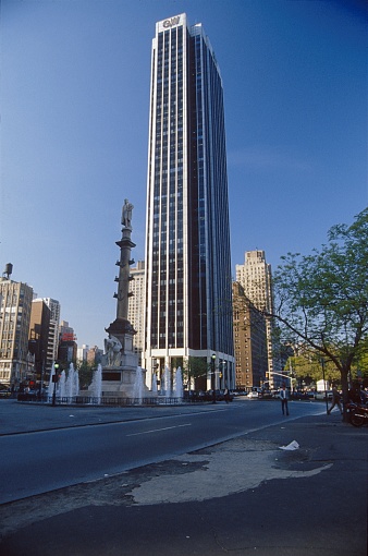 New York City, NY, USA, 1988. At Columbus Circle next to Central Park in Midtown Manhattan. Also: pedestrians, the Column of Columbus and the current Trump International Tower.