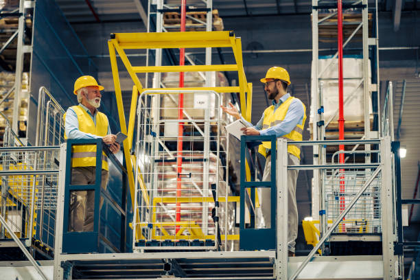 istock Managers in warehouse discuss about new strategy 1468632713