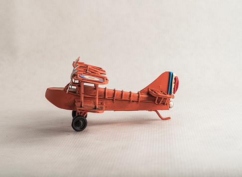 The photograph of a plane from the First World War in red steel vintage metal figures for collection