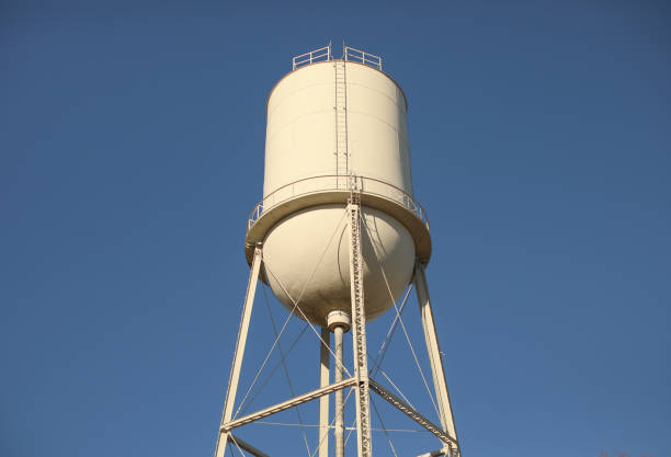 istock Water tower reserve in the blue sky standing industry 1468637624