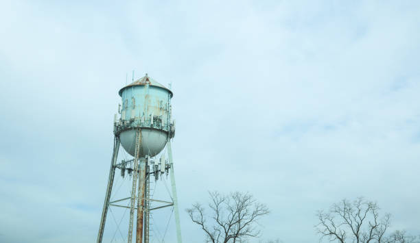 istock Water tower reserve in the blue sky standing industry 1468637632