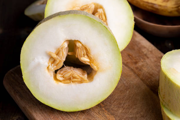 istock Cut into pieces ripe yellow melon with sweet pulp 1468641983