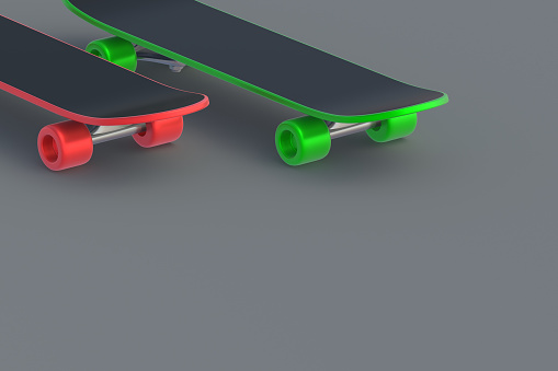 Skateboards on gray background. Hobbie and leisure. Sports equipment. Copy space. 3d render