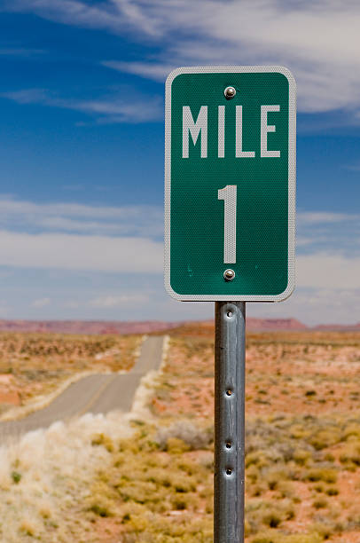 istock Mile 1 one marker on desert highway vertical 146864740
