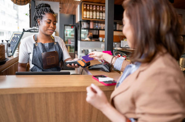 istock Customer paying cafe bill with contactless credit card 1468654377