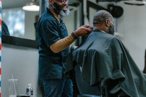istock Barber at work in barber shop 1468655187