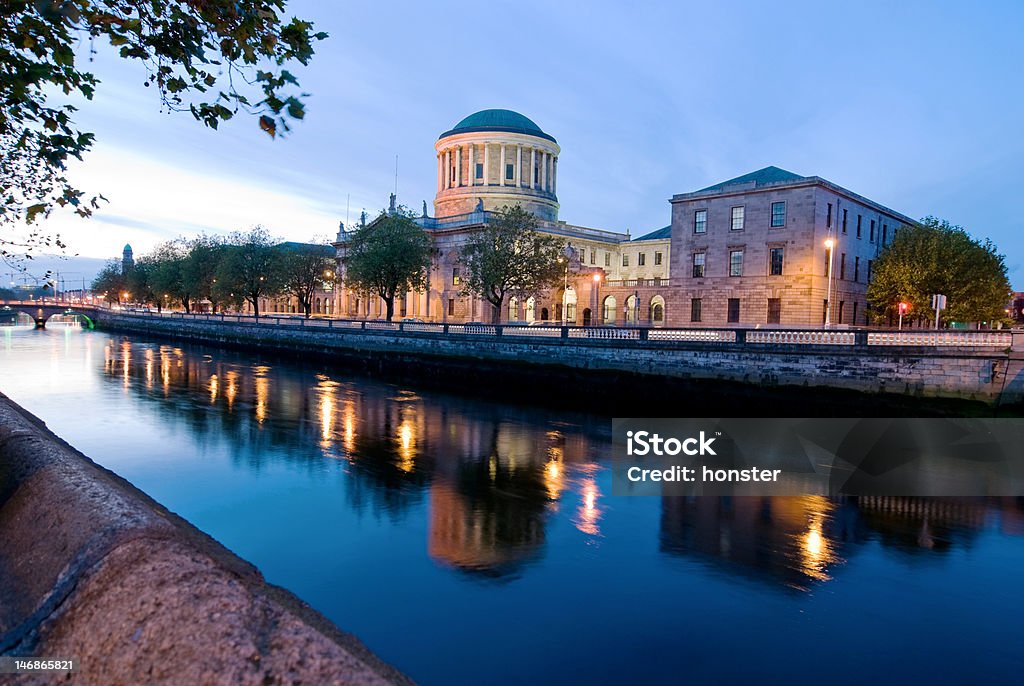 Four Courts and River Liffey The Four Courts and River Liffey in Dublin in the evening. Dublin - Ireland Stock Photo