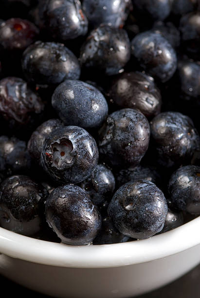 Blueberries in bowl stock photo