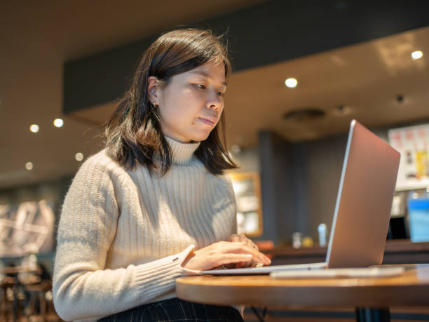 istock single woman listening to office with coffee 1468667454