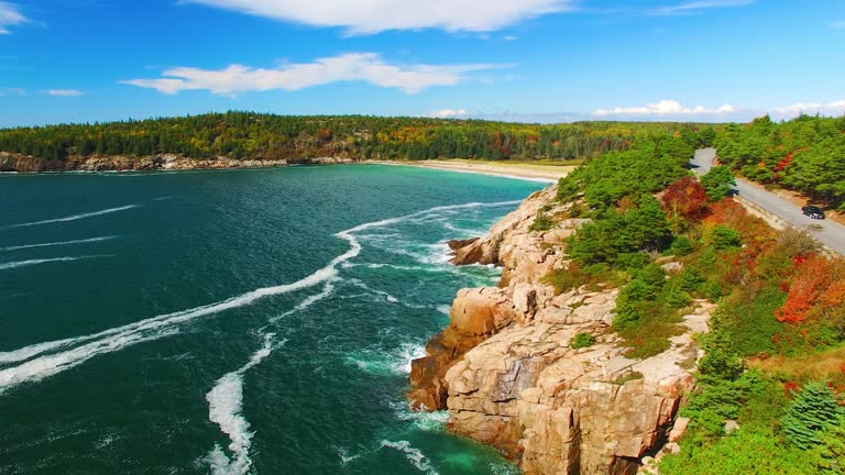 Aerial view of Acadia National Park coastline in foliage season, Maine