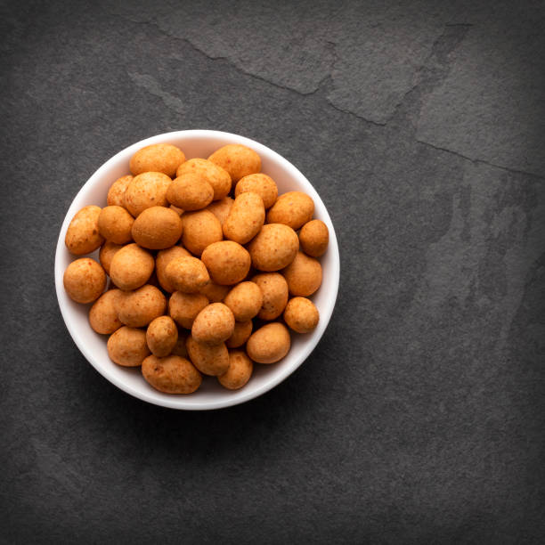 istock Organic mexican peanuts in the bowl - Arachis hypogaea 1468671139
