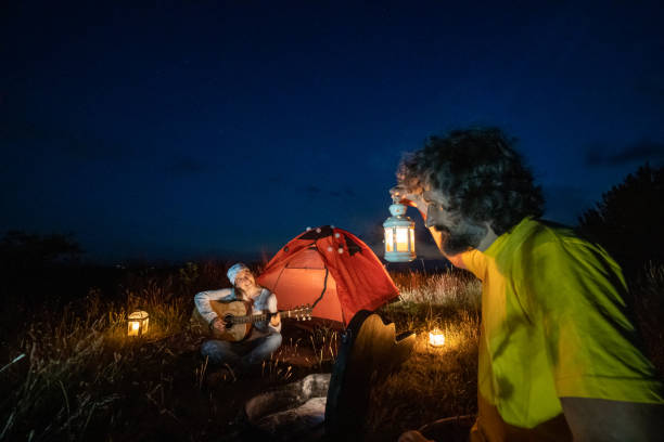 istock Romantic eco vacation. Tent camping at night. 1468676843