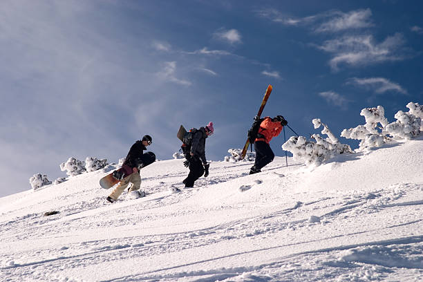 istock Group of off-piste riders climing a slope 146867712