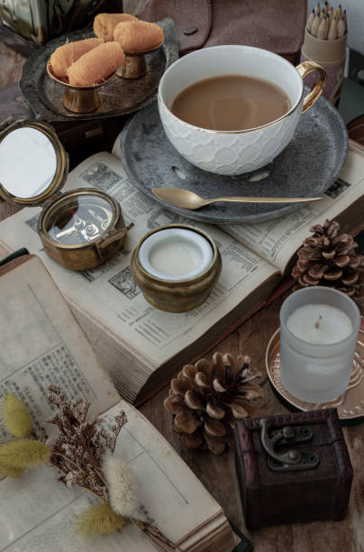 istock Hot coffee in ceramic cup and Fresh milk served with Sweet egg floss on old wooden worktable. 1468678322